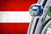 Ciężarówka do transportu drogowego i flaga Austrii